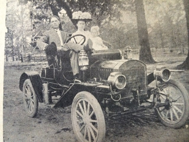 6. Mr. &amp; Mrs. A.C. White and daughter in 1911 Baby Maxwell automobile bought for mail route, SH, 11-8-61, p. 18
