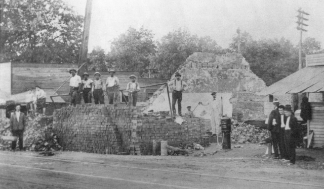 1ga. Cleanup on August 7, 1915 following a fire near the corner of Atlanta Road and East Spring StreetScan