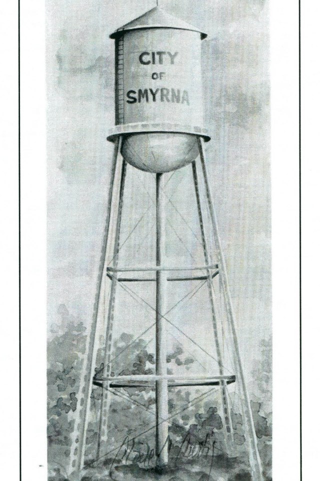 1hab. The Smyrna Water Tower stood behind the Memorial Cemetery adjacent to King Street