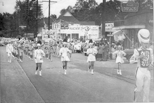 8. Campbell High School Marching Band, 1953, passing by corner of Atlanta Road and West Spring Street (current Market Village entryway)