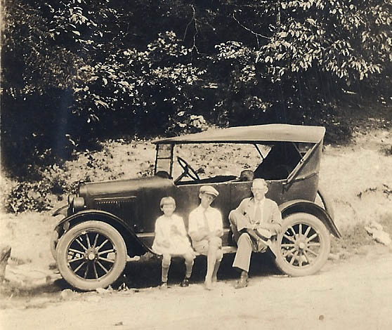9. Helen, Robert, and Carl Terrell and atomobile about 1926