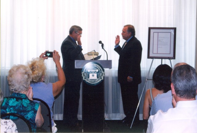 Joe Griggers swearing in Max Bacon as postmaster 2002